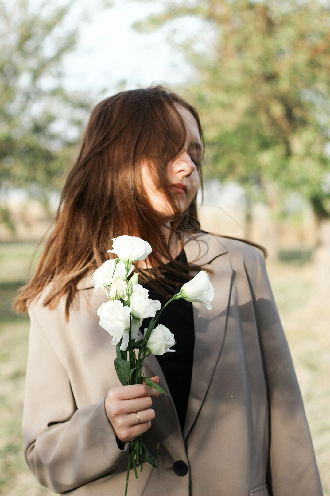 Portrait of a smiling woman in a blazer