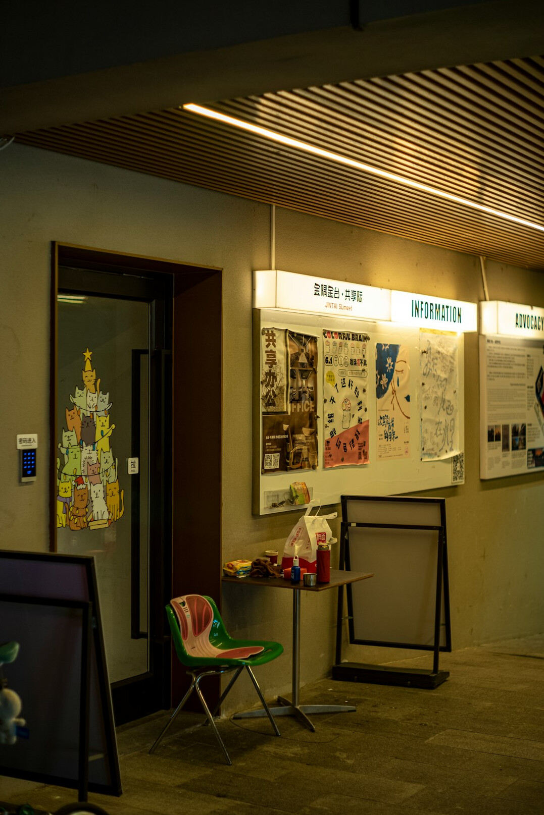 People collaborating in a meeting with whiteboard