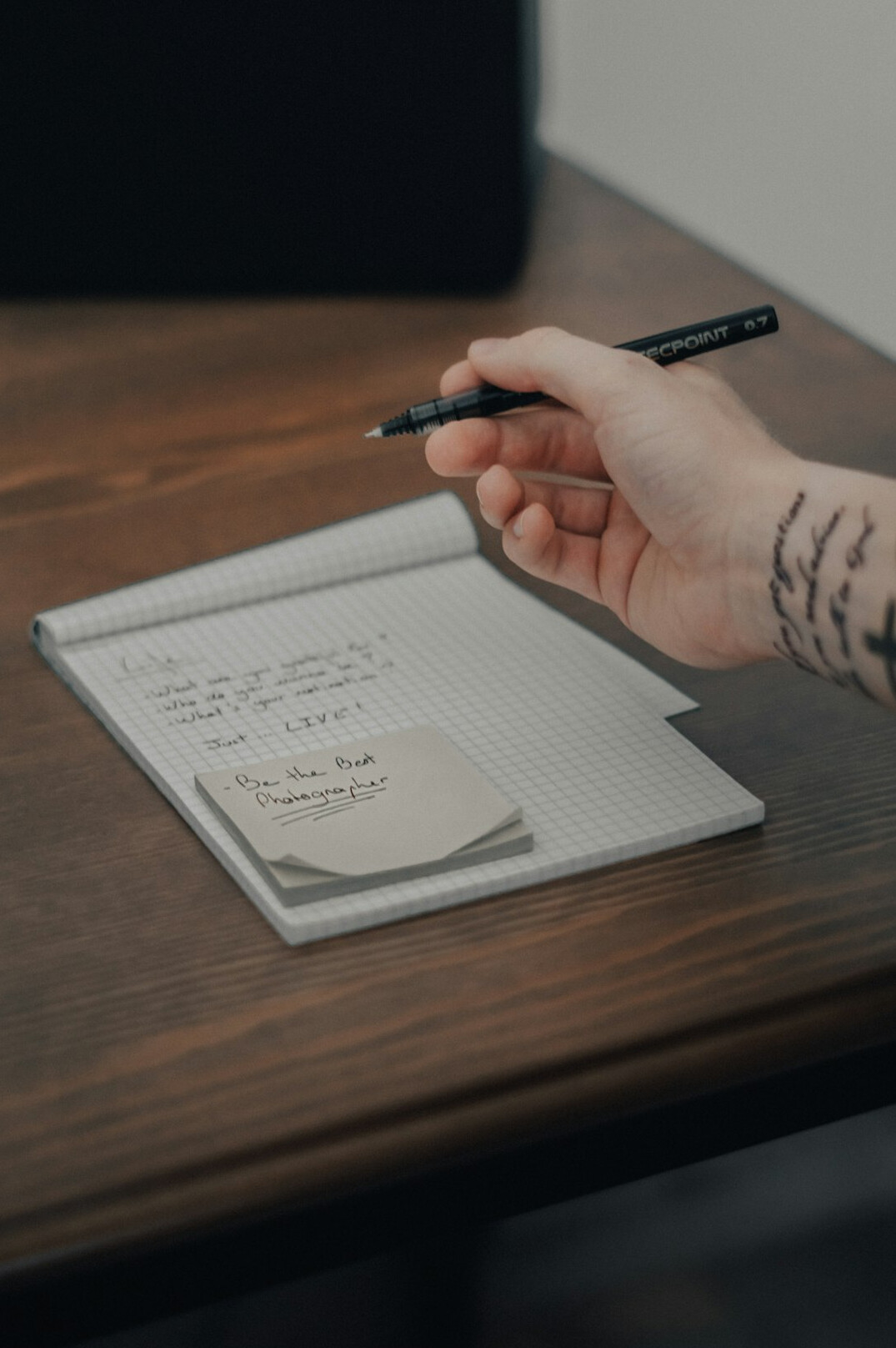 person setting goals on paper